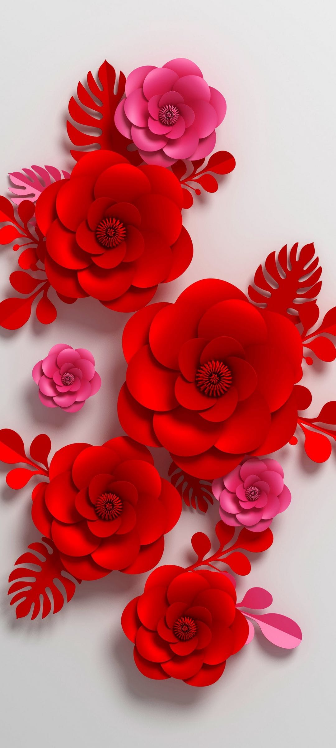 Red and pink 3D paper flowers with crimson leaves are artfully arranged on a clean white minimalist background.