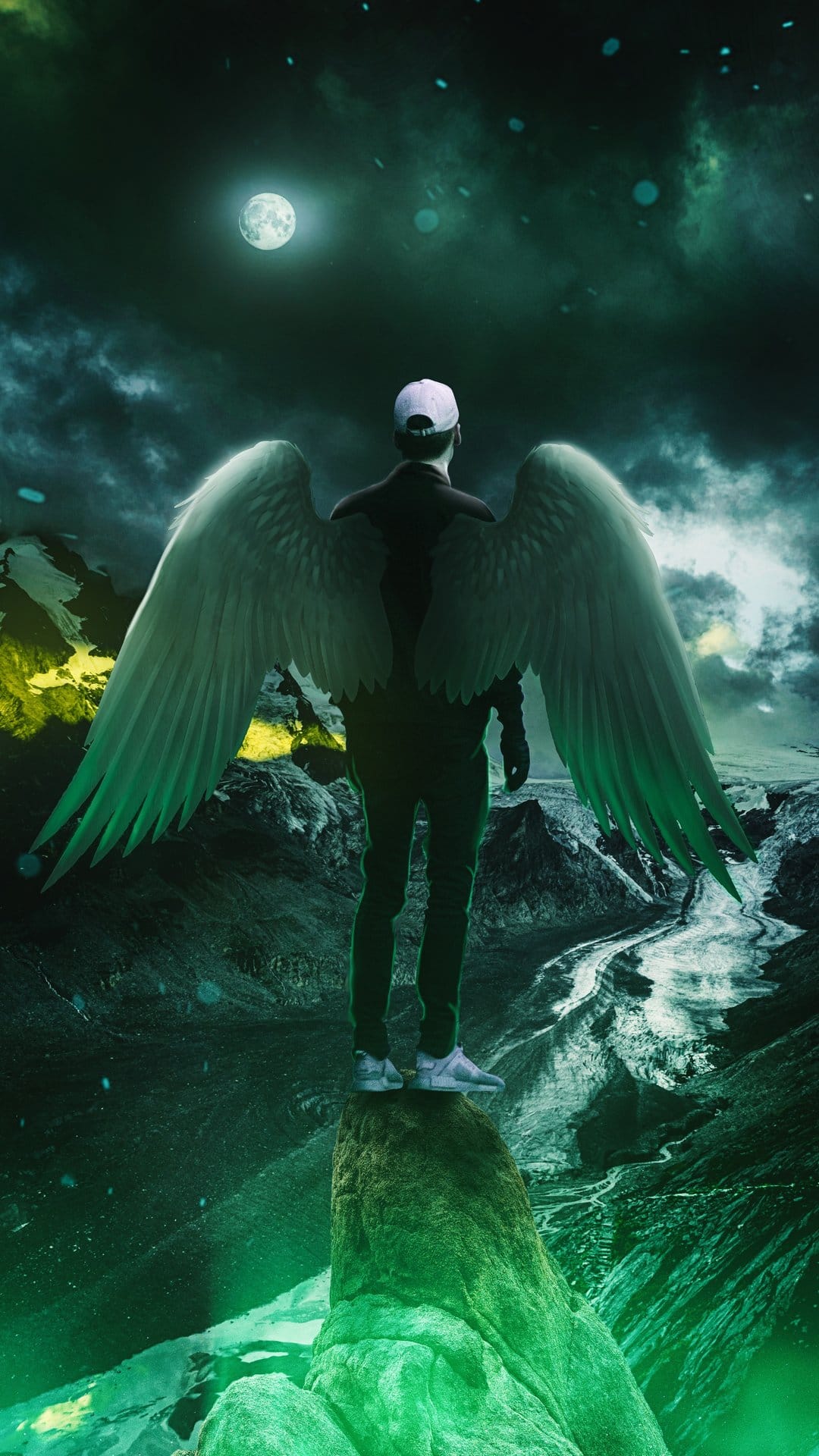 Winged angel perches on a jagged cliff overlooking a foggy mountain pass under a glowing moonlit sky.