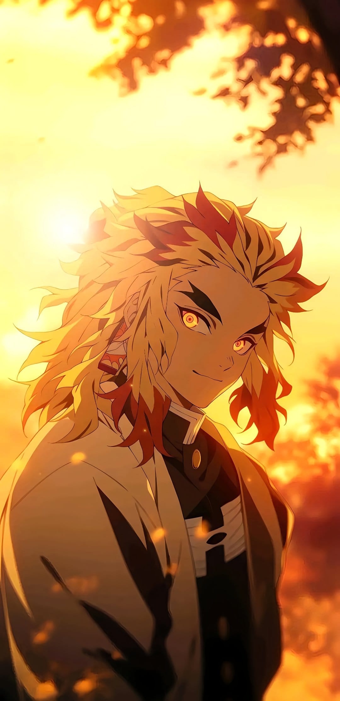 Kyojuro Rengoku with flame-patterned hair and golden eyes stands before a glowing orange sunset and blurred trees.