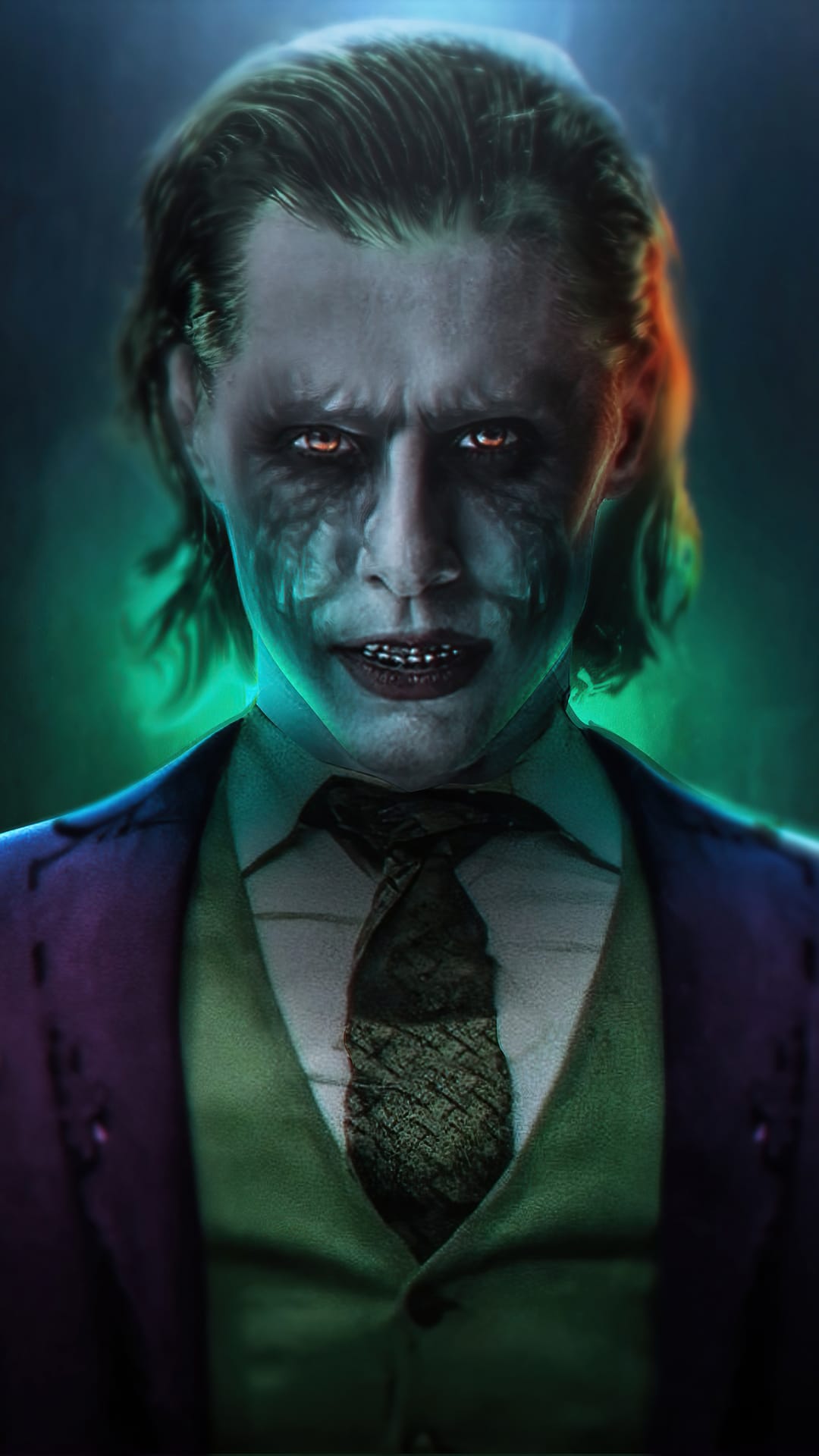 The Joker wearing a purple suit and green vest smiles menacingly while bathed in eerie green light.