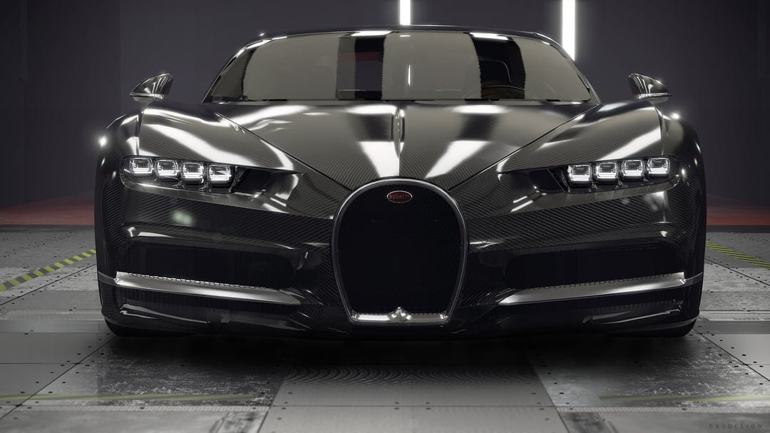 Front view of a black carbon fiber Bugatti Chiron hypercar with glowing LED headlights in a modern studio.