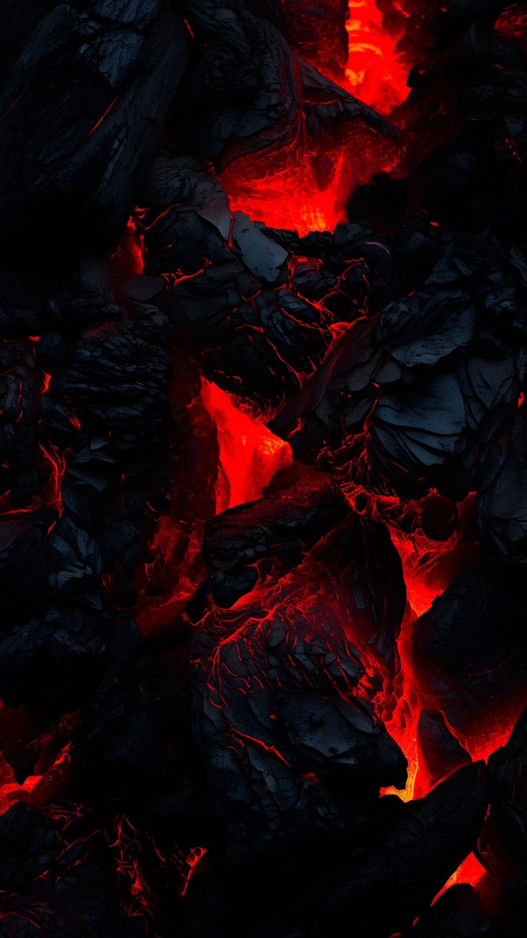 Molten orange lava seeps through jagged cracks in dark volcanic rock, creating a high-contrast geological texture.