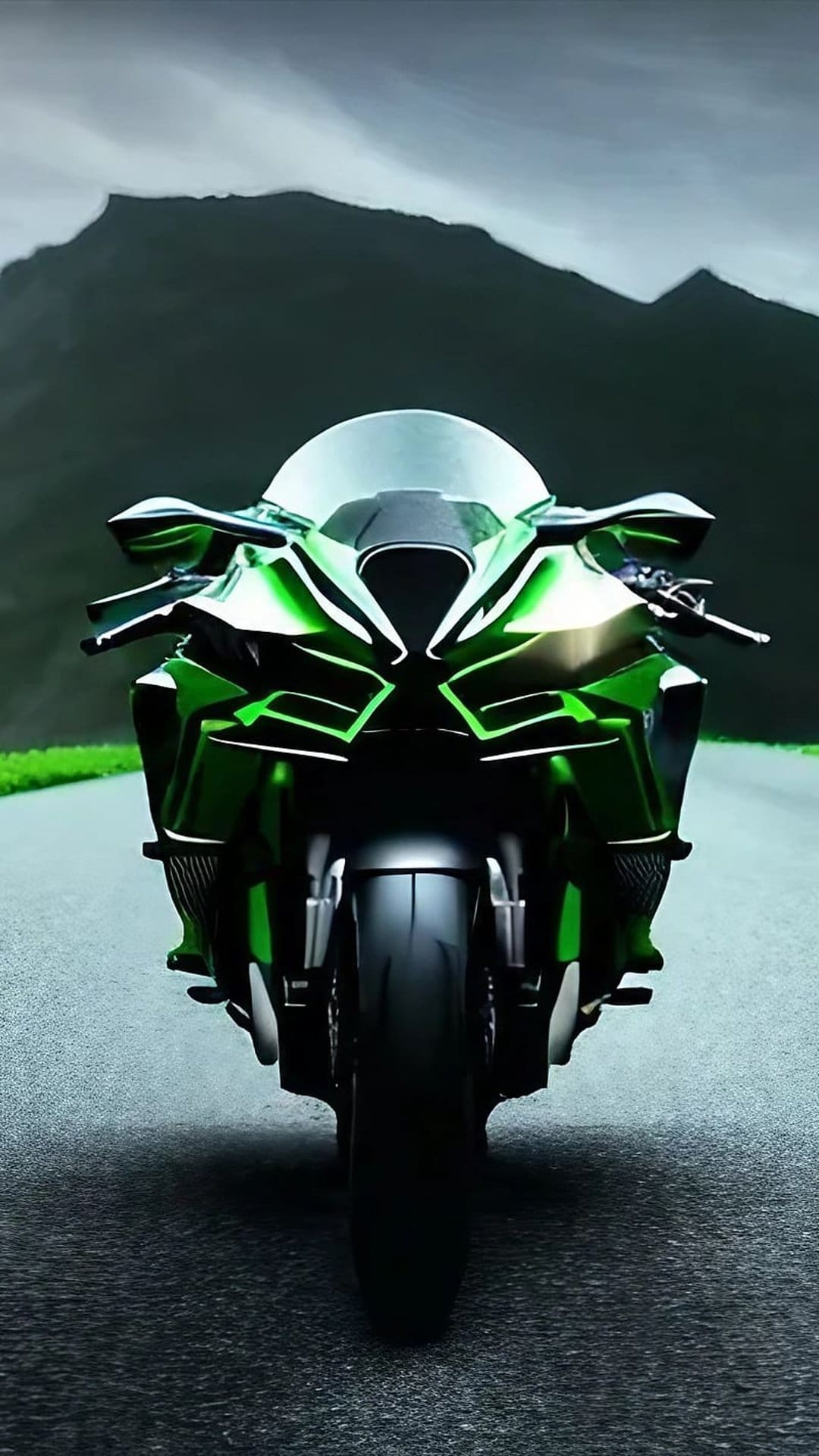 Green Kawasaki Ninja sportbike parked on an asphalt road with dark mountains and a cloudy sky in the background.