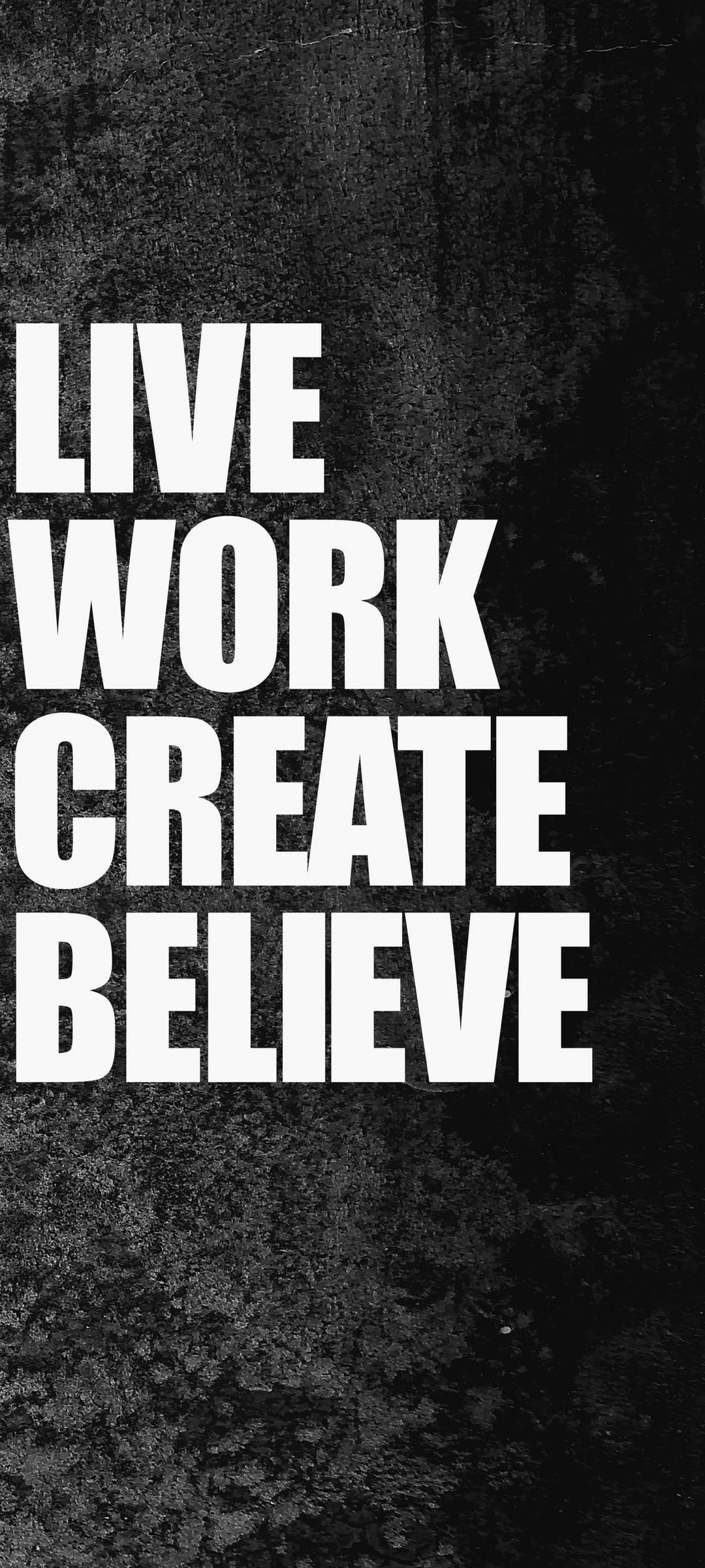 Bold white lettering spells Live Work Create Believe on a dark gritty textured background for mobile devices.