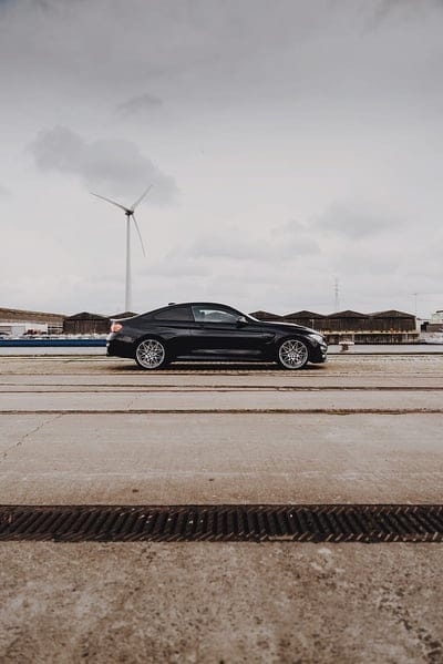bmw m4, bmw, car, sportscar, side view, black, mobile wallpaper, android wallpaper, iPhone wallpaper, phone wallpaper