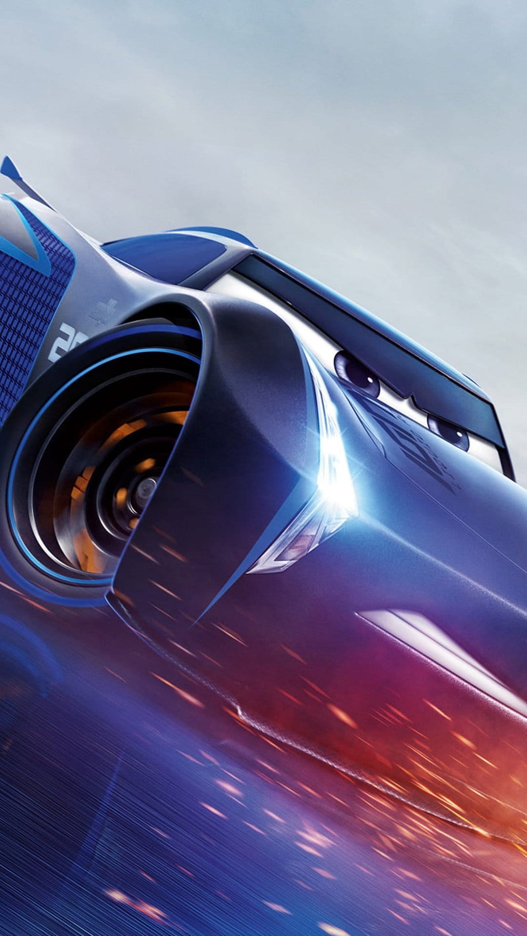 Jackson Storm racing car accelerates along a track with sparks flying beneath its sleek blue and silver body.