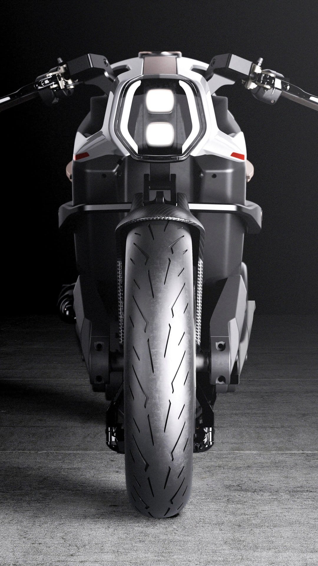 Futuristic motorcycle front view featuring angular white LED headlights and wide tires on a dark background.
