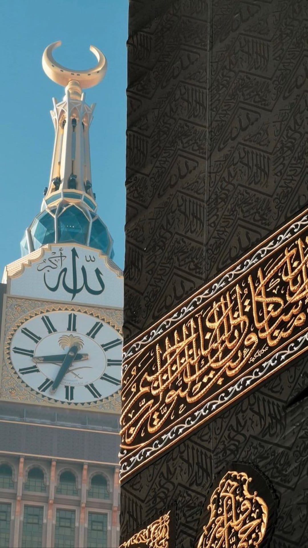 Kaaba draped in gold calligraphy beside the Makkah Clock Tower with a crescent moon under a bright blue sky.