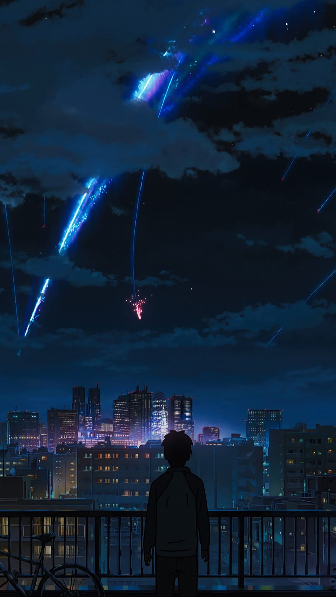 A person stands on a rooftop balcony watching purple meteors fall over a glowing city skyline at night.