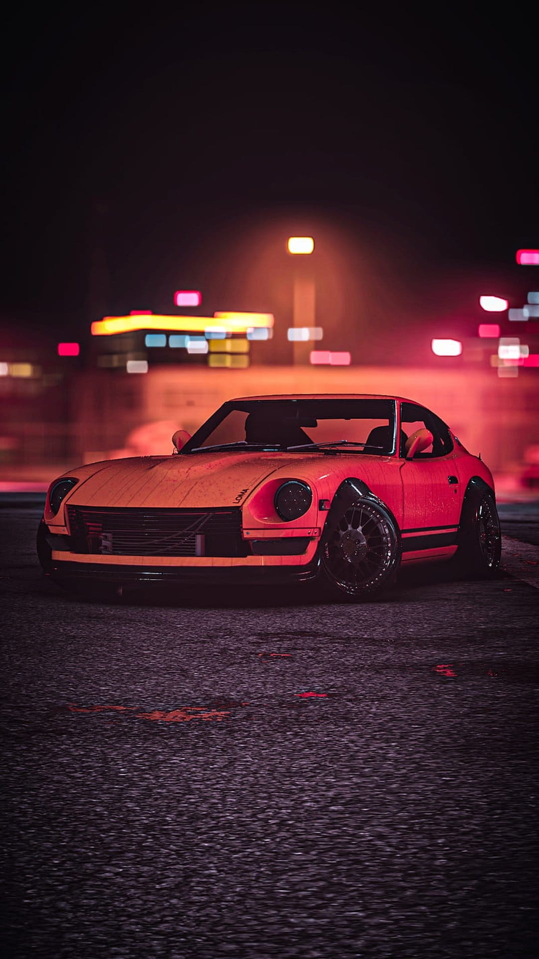 Nissan 240Z sports car with orange paint parked on a wet street with colorful bokeh city lights in the background.