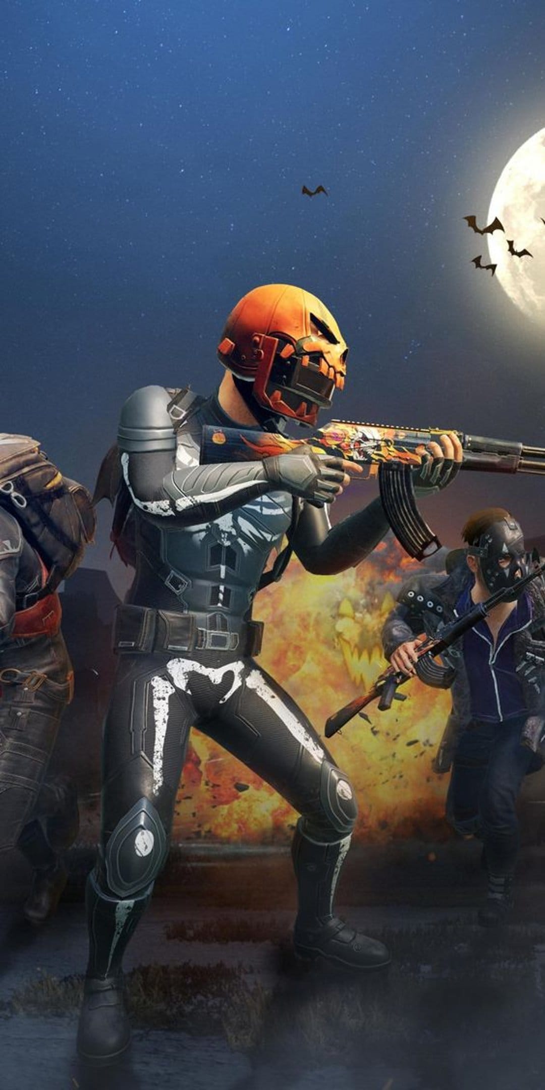 Skeleton-patterned soldier with a pumpkin helmet aims a rifle as fire explodes behind under a full moon and bats.