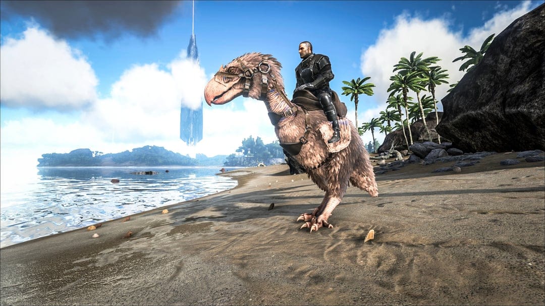 Person in black armor riding a feathered Terror Bird on a sunny beach with a massive obelisk in the background.