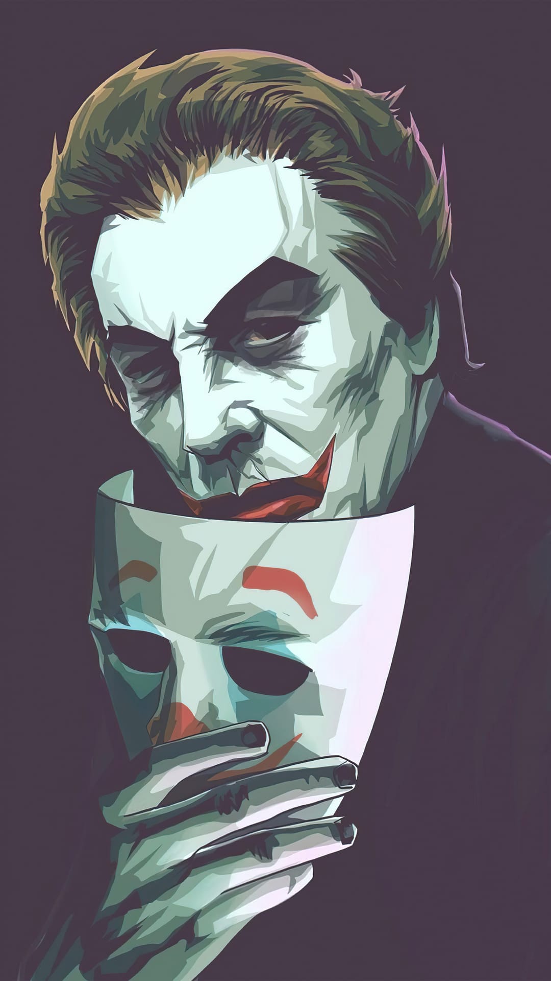 The Joker holds a smiling white mask away from his face, revealing a grimace and dark, shadowy eyes beneath.