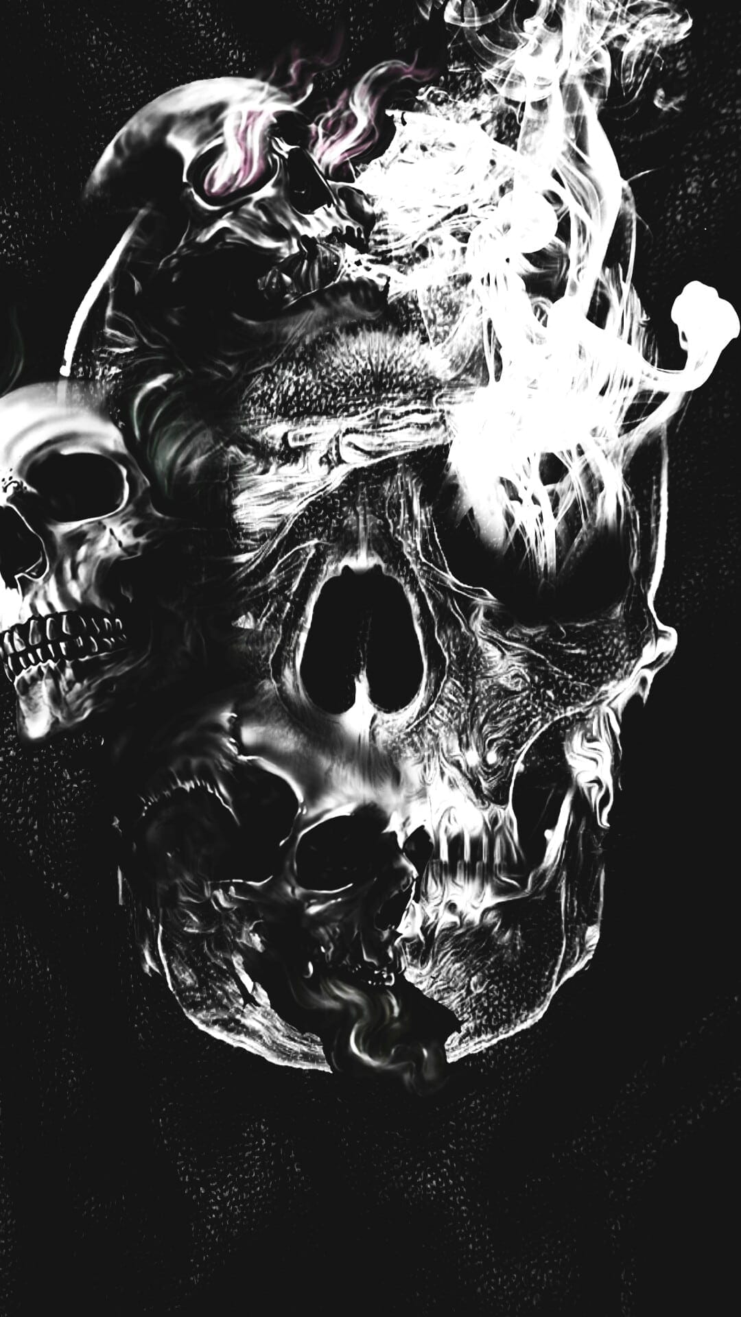 Two detailed human skulls dissolve into swirling gray smoke and wispy vapors against a dark, shadowy void.