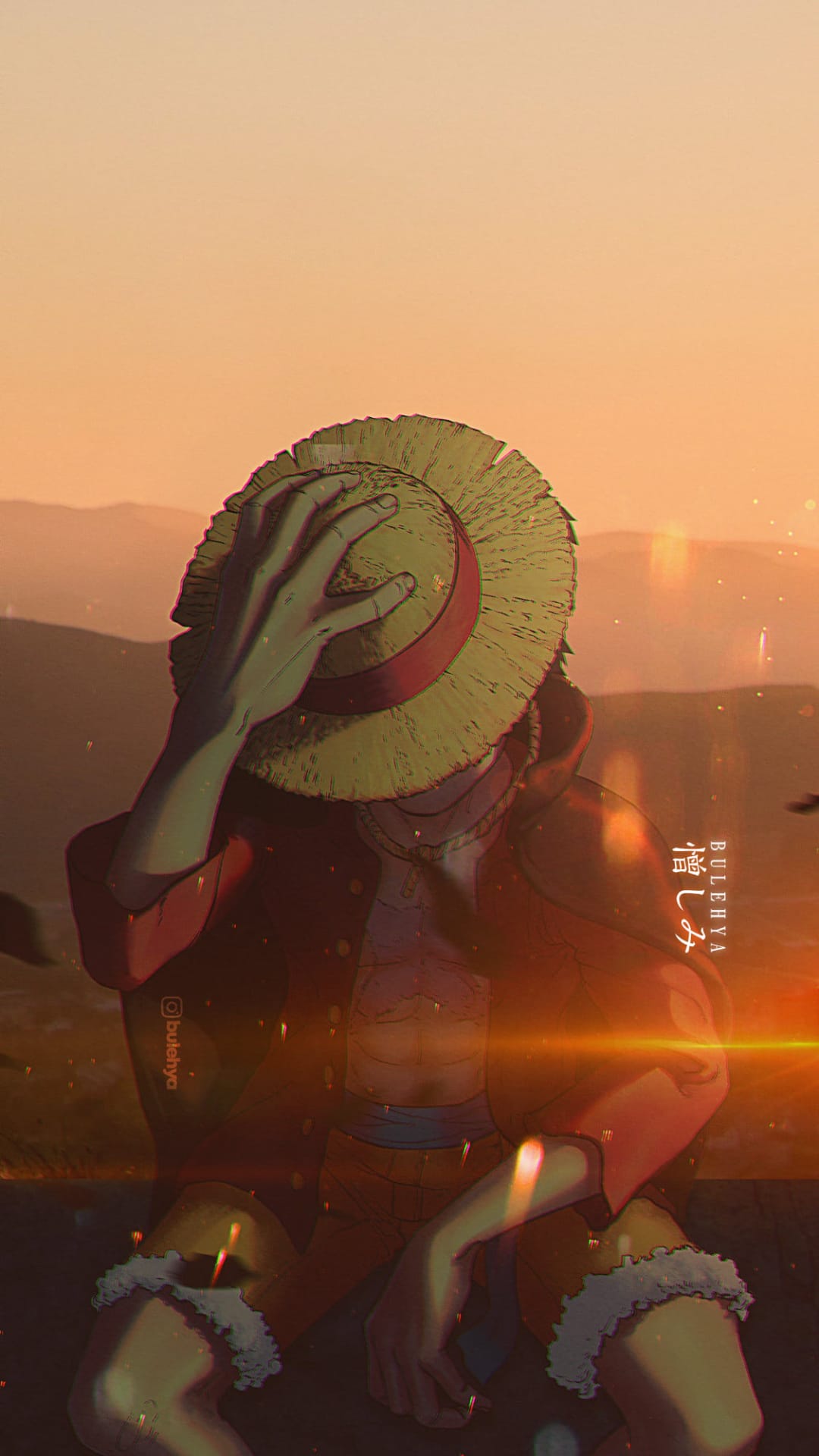 Monkey D. Luffy sits alone on a cliffside during sunset with his straw hat shading his eyes in this background.