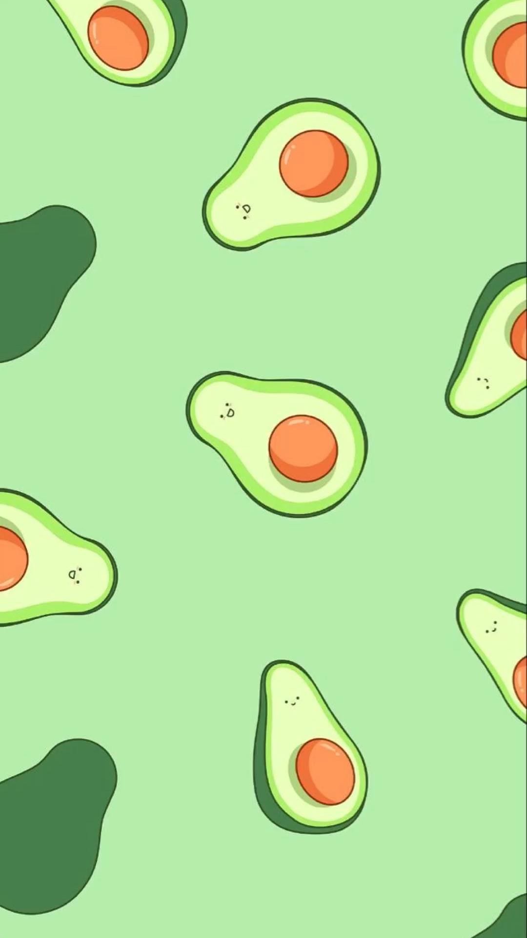 Avocado halves with brown pits and cheerful faces repeat across a light green surface in a portrait layout.