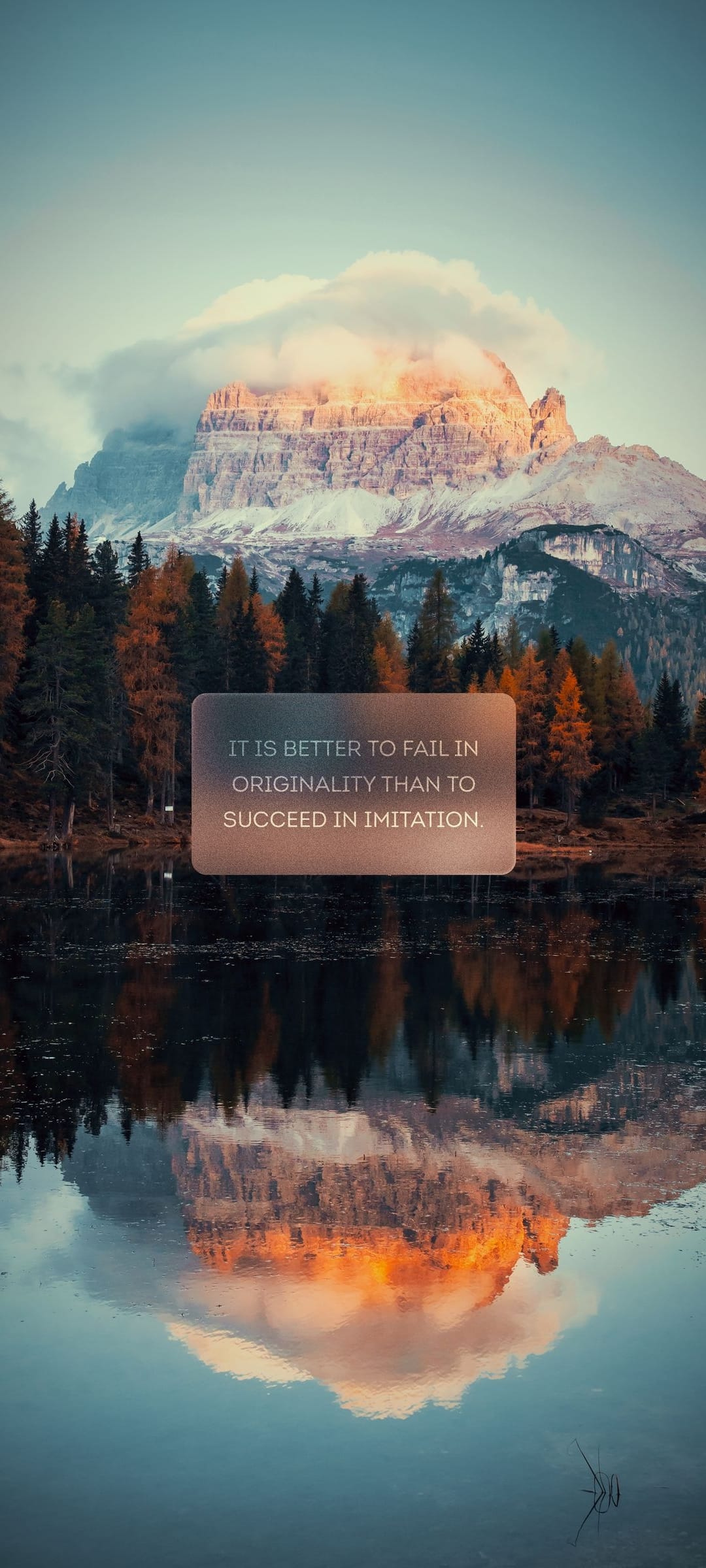 Sharp mountain peaks and golden autumn trees reflected in a still lake with a quote about originality.