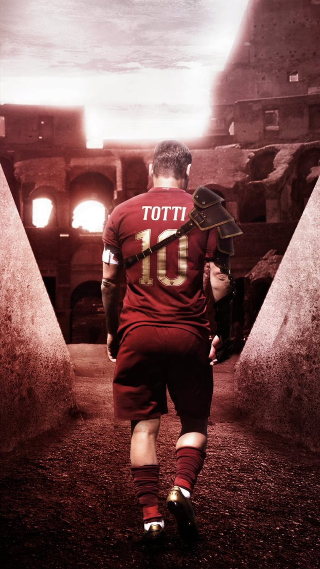 Francesco Totti in a number 10 jersey stands as a gladiator inside the sunlit stone arches of the Colosseum.