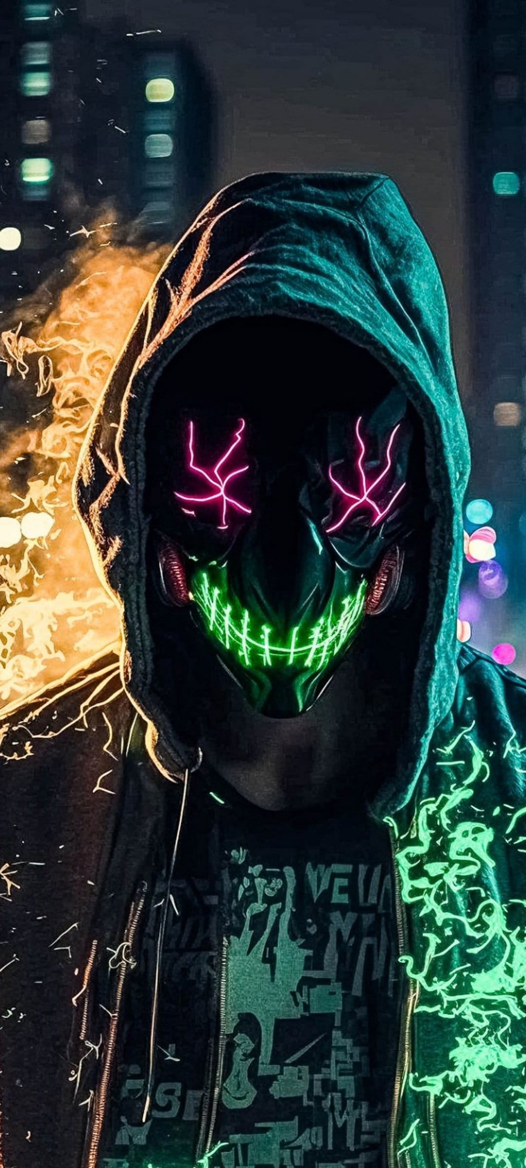 Person wearing a grinning neon-lit mask and circuitry-patterned hoodie in a dark futuristic city.