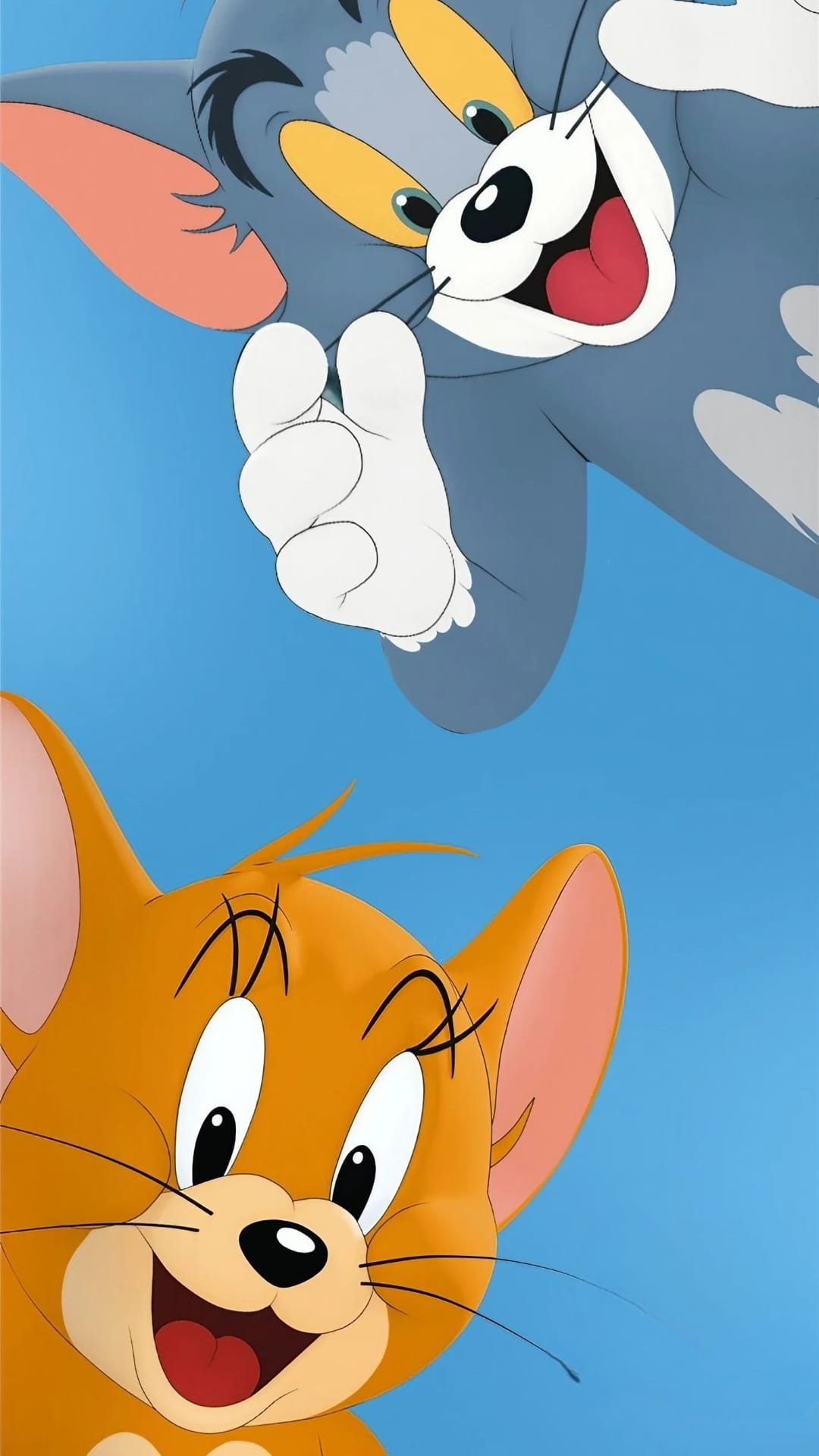 Tom the cat and Jerry the mouse smile while peeking over a white edge in a clean animated vertical layout.