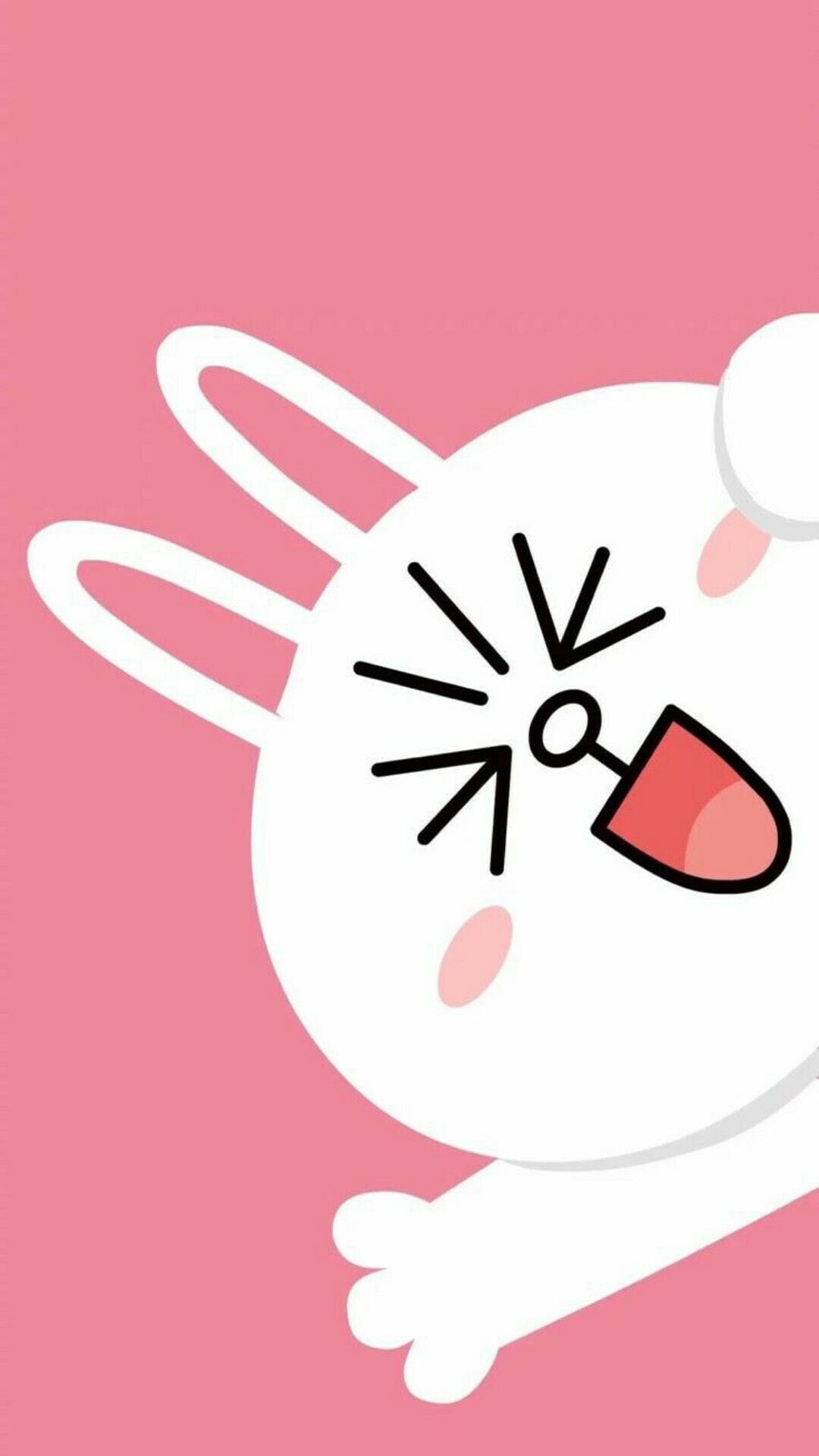 White laughing bunny with rosy cheeks peeking from the side over a vibrant solid pink background backdrop.