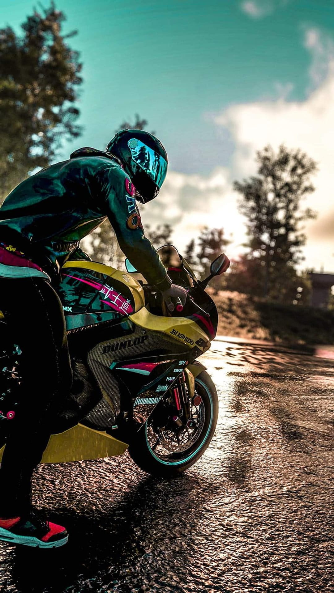 Motorcyclist in a sleek jacket and helmet sits on a sportbike over wet asphalt with glowing road reflections.