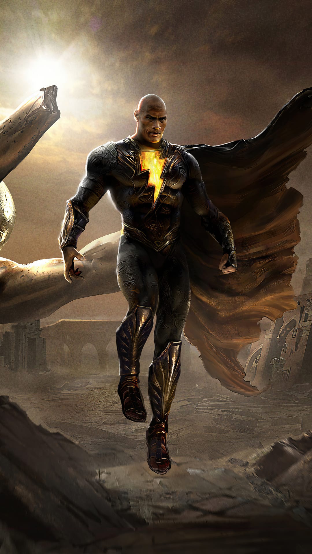 Black Adam floats in a desert wearing a black and gold suit with a glowing yellow lightning bolt on his chest.