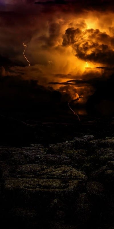 Lightning, storm, dramatic, nature, sky, thunder, clouds, wilderness, powerful, intense, weather, outdoors, landscape, dark, orange, eerie, dynamic, natural phenomenon, striking, electricity.