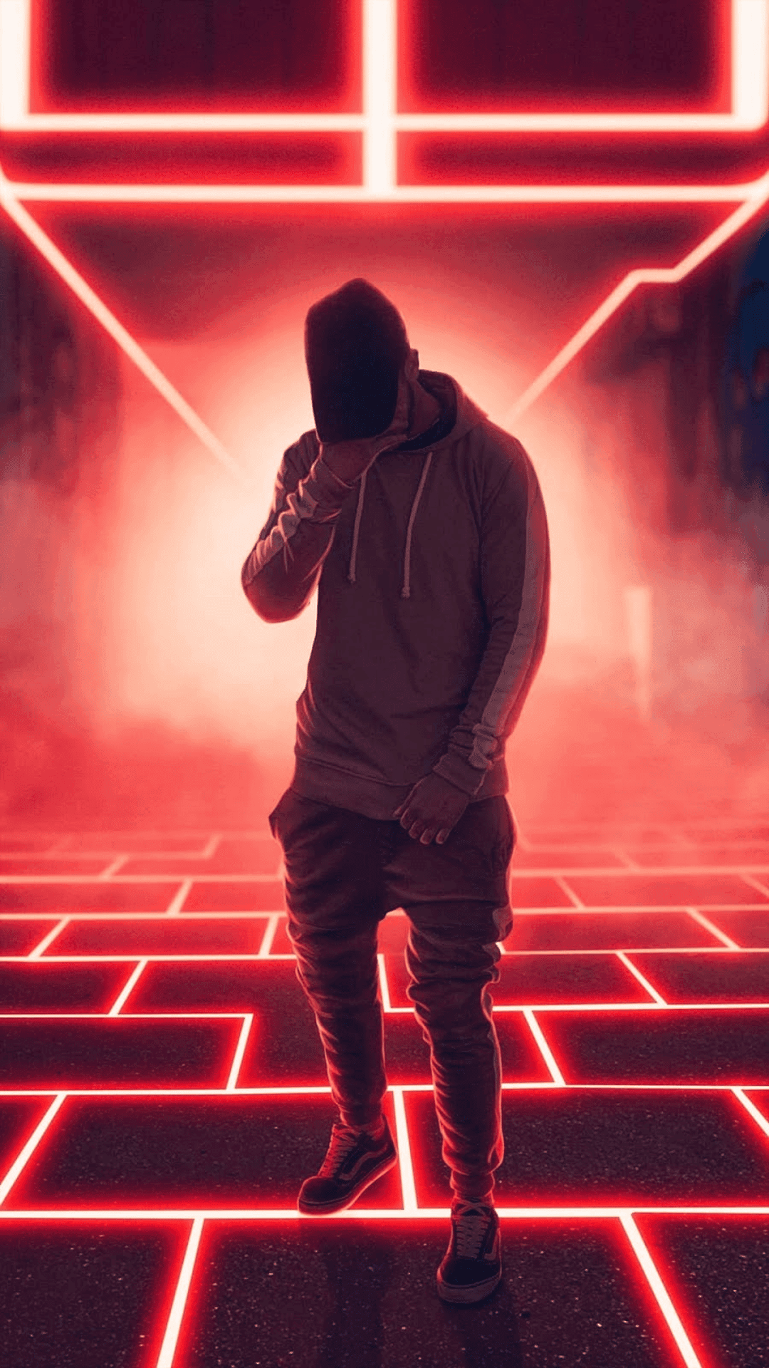 Hooded figure stands at the top of glowing red neon stairs in a dark, high-contrast futuristic hallway.