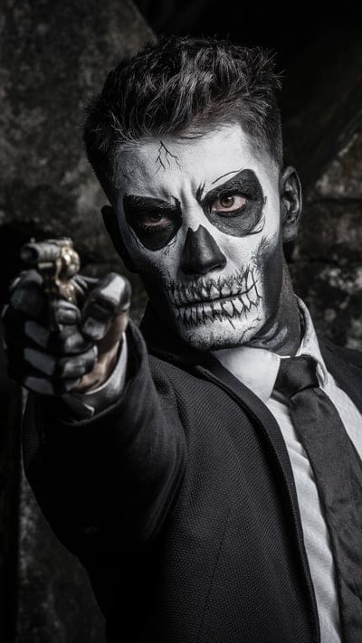 skullfacepaint,guninhand,villan,black,boy,mask,attitude